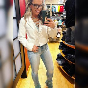 Image from @looks.like.lori on 7 Apr 2023 with caption: I keep hearing that skinny jeans are going out of style but I love them, especially when you have a cute pair of boots to show off. These Buckle Black fit 35 are a staple for your closet, a light wash denim with very little destruction, only around the ankles. #buckledout #bucklestyle #forthestyledlife #bucklejeans #cowprint #croppedblazer #bootieseason buckle #linkinbio to shop my buckle outfits- or comment/message me for links.