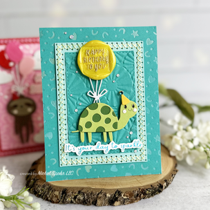 Image from nicholspohr on 22 Nov 2024 with caption: Welcome to the teamspellbinders November 2024 Birthday Bliss Blog Hop! Today I'm featuring 2 NEW CARDS created with products from the November 2024 Spellbinders Club Kits, and each card features the Stitching Dies of the Month, Cross Stitch Nested Card Front & Tag, along with many products from the other Club Kits!

Take your birthday card game to the next level by adding a personal touch with handmade texture! In this video, I'll show you how to create unique and eye-catching birthday cards that will make the recipient feel special. From adding stitching, foiling, and embossing, I'll cover various techniques to give your cards a handmade look. Whether you're a seasoned crafter or a beginner, this tutorial is perfect for anyone looking to add a personal touch to their birthday cards. So, get creative and let's get started!

→ Be sure to swipe to see the aqua/green turtle birthday card, too!

#spellbinders #teamspellbinders #spellbindersclubkits #diecutting #glimmerhotfoilsystem #nicholspohr #sssunitedwecraft #nicholspohrllccreation